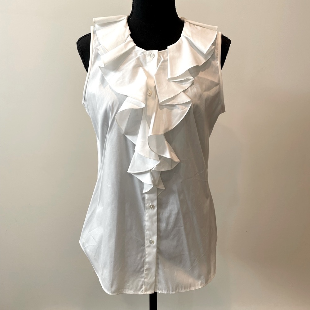 White Size 8 ruffle sleeveless button down shirt.